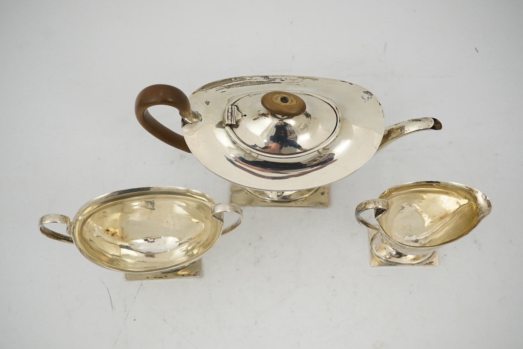 A George V silver three piece tea set by Fenton Brothers Ltd